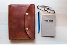 Load image into Gallery viewer, Wickett and Craig Buck Brown Harness Leather A5 Leather notebook Cover