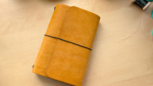 Load image into Gallery viewer, Handmade A5 Trifold Travel Notebook in Golden Yellow Badalassi Carlo Pueblo Italian Vegetable Tanned Leather.