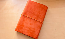 Load image into Gallery viewer, Handmade A5 Leather Trifold Travel Notebook in Mandarin Orange Italian leather