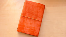 Load image into Gallery viewer, Handmade A5 Leather Trifold Travel Notebook in Mandarin Orange Italian leather