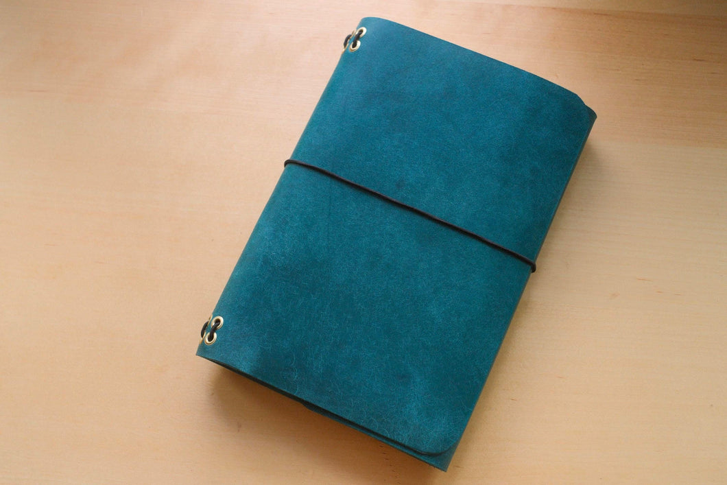 Handmade A5 Trifold Travel Notebook in Ortensia Blue Badalassi Carlo Pueblo Italian Vegetable Tanned Leather.