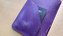 Load image into Gallery viewer, Handmade A5 Trifold Travel Notebook with inside pocket in Purple Italian Vegetable Tanned Leather.
