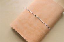 Load image into Gallery viewer, Handmade A5 Trifold Travel Notebook in Natural Badalassi Carlo Pueblo Italian Vegetable Tanned Leather.
