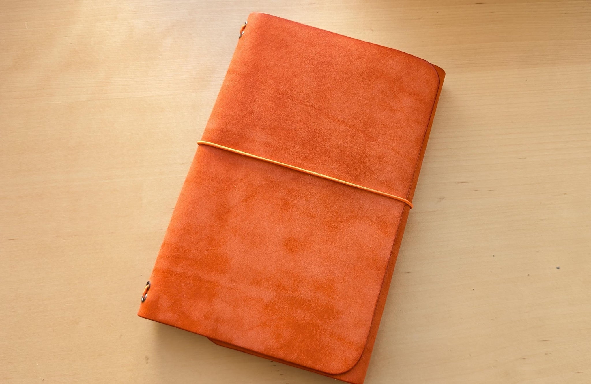 Handmade A5 Leather Trifold Travel Notebook in Mandarin Orange